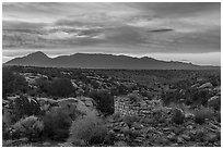 Pueblo and Sleeping Ute Mountain, sunrise. Hovenweep National Monument, Colorado, USA ( black and white)