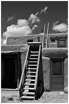 Ladder used to access upper floor of pueblo. Taos, New Mexico, USA ( black and white)