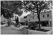 Plazza, statue, and hotel La Fonda. Taos, New Mexico, USA ( black and white)