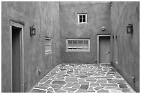 Courtyard and adobe walls. Taos, New Mexico, USA ( black and white)