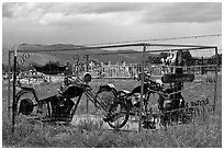 Grave with motorbikes, Truchas. New Mexico, USA (black and white)