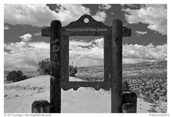Historic marker framing high desert landscape. New Mexico, USA