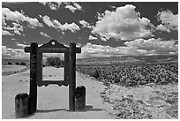 Marker and high desert scenery. New Mexico, USA (black and white)