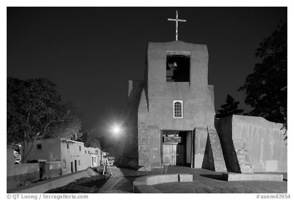 Oldest church and house in the US by night. Santa Fe, New Mexico, USA (black and white)