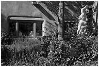 Front yard with sculpture, Canyon Road. Santa Fe, New Mexico, USA ( black and white)