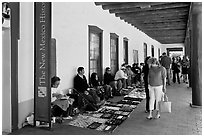 Palace of the Governors with native vendors. Santa Fe, New Mexico, USA (black and white)