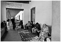 Native americans selling in front of the Palace of the Governors. Santa Fe, New Mexico, USA (black and white)