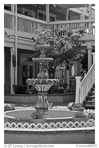 Fountain and white guardrails, old town. Albuquerque, New Mexico, USA