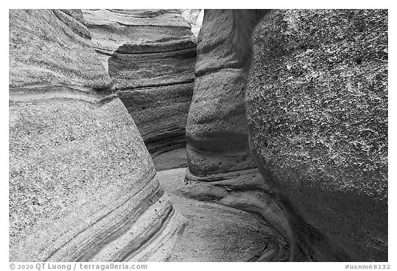 Curvy walls of slot canyon. Kasha-Katuwe Tent Rocks National Monument, New Mexico, USA (black and white)