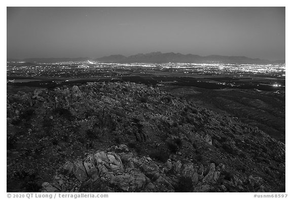 Las Cruces and Organ Mountains at night from Picacho Mountain. Organ Mountains Desert Peaks National Monument, New Mexico, USA (black and white)
