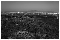 Las Cruces and Organ Mountains at night from Picacho Mountain. Organ Mountains Desert Peaks National Monument, New Mexico, USA ( black and white)
