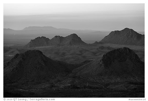 Cluster of Dona Ana mountains peaks at sunset. Organ Mountains Desert Peaks National Monument, New Mexico, USA (black and white)
