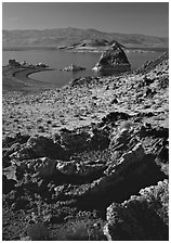 Tufa rock and pyramid. Pyramid Lake, Nevada, USA ( black and white)