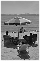 Beach unbrella and family, Sand Harbor, Lake Tahoe-Nevada State Park, Nevada. USA (black and white)