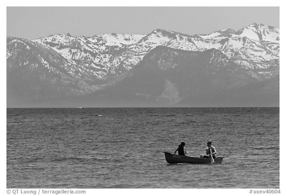 Canoe and snowy mountains, Lake Tahoe, Nevada. USA (black and white)