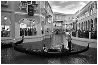 Family gondola ride inside Venetian casino. Las Vegas, Nevada, USA (black and white)