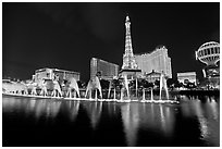 Paris casino and Bellagio fountains by night. Las Vegas, Nevada, USA (black and white)