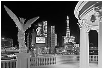 Gazebo and statue of Caesar Palace frames Ballys and Paris Hotel. Las Vegas, Nevada, USA ( black and white)