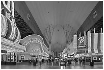 Pedestrian, canopy-covered section of Fremont Street. Las Vegas, Nevada, USA (black and white)