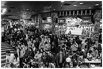 Crowded carnival game area. Reno, Nevada, USA (black and white)