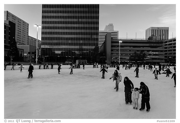 Skaters on holiday ice rink. Reno, Nevada, USA (black and white)