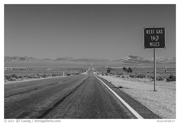 Highway and Next Gas 163 miles sign. Nevada, USA