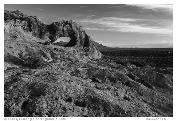 Slab and natural arch, early morning. Basin And Range National Monument, Nevada, USA (black and white)