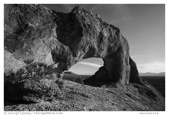 Natural arch through volcanic rock. Basin And Range National Monument, Nevada, USA (black and white)