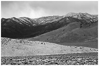 Foothills and snowy mountains, Mt Irish range. Basin And Range National Monument, Nevada, USA ( black and white)