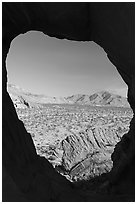 View through rock opening, Whitney Pocket. Gold Butte National Monument, Nevada, USA ( black and white)