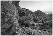 Petroglyphs and setting sun. Gold Butte National Monument, Nevada, USA ( black and white)