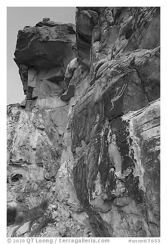 Cliff with falling Man petroglyph. Gold Butte National Monument, Nevada, USA (black and white)