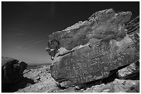 Newspaper Rock with petroglyphs at night with moonlight. Gold Butte National Monument, Nevada, USA ( black and white)