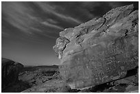 Rock with petroglyphs at night with clouds. Gold Butte National Monument, Nevada, USA ( black and white)
