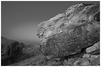 Newspaper Rock with petroglyphs at half light. Gold Butte National Monument, Nevada, USA ( black and white)