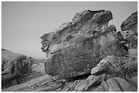 Newspaper Rock with petroglyphs at twilight. Gold Butte National Monument, Nevada, USA ( black and white)