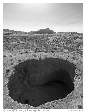 Aerial view of Devils Throat sink hole. Gold Butte National Monument, Nevada, USA (black and white)