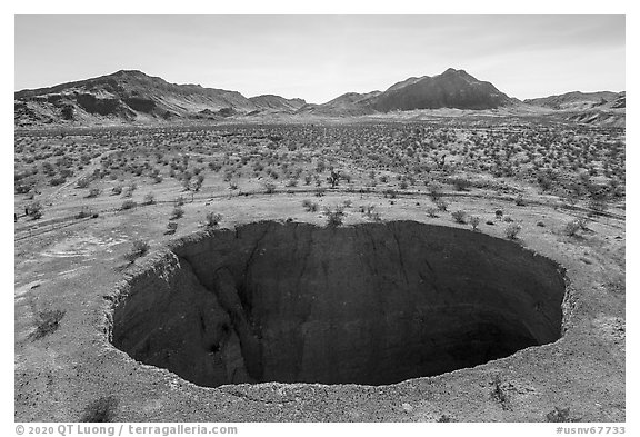 Aerial view of Devils Throat sinkhole. Gold Butte National Monument, Nevada, USA (black and white)