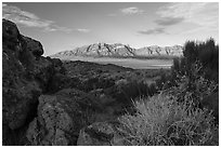 Ash boulders framing Worthington Mountains. Basin And Range National Monument, Nevada, USA ( black and white)