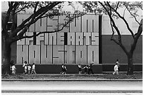 Children strolling in front of Museum of Fine Arts. Houston, Texas, USA ( black and white)