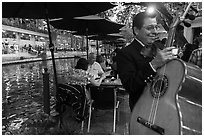 Musician on Riverwalk. San Antonio, Texas, USA ( black and white)