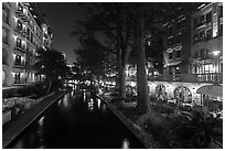 Residences and restaurants, Riverwalk at night. San Antonio, Texas, USA ( black and white)