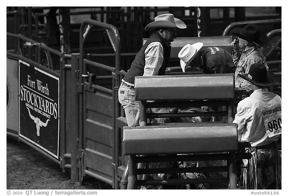 Men and gates, Stokyards Rodeo. Fort Worth, Texas, USA (black and white)