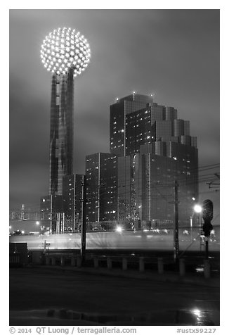 Reunion Tower and passing train at night. Dallas, Texas, USA (black and white)