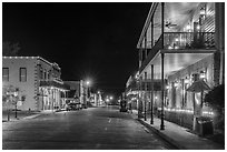 Street with historic buildings at night. Jefferson, Texas, USA ( black and white)