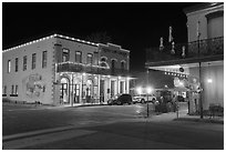 Historic Kahn and Jefferson hotels at night. Jefferson, Texas, USA ( black and white)