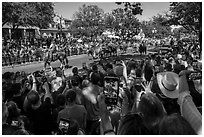 Tourists capture cow parade with phone cameras. Fort Worth, Texas, USA ( black and white)