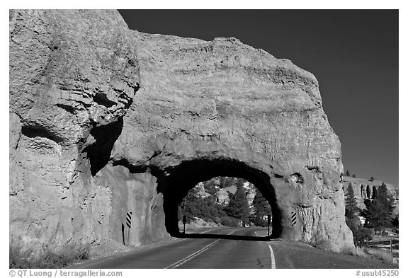 Road tunnel in pink limestone cliff. Utah, USA (black and white)