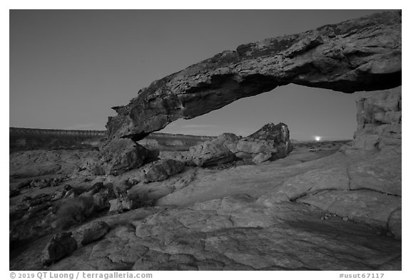 Sunset Arch with setting moon. Grand Staircase Escalante National Monument, Utah, USA (black and white)