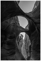 Double arches and sky, Peek-a-Boo slot canyon. Grand Staircase Escalante National Monument, Utah, USA ( black and white)
